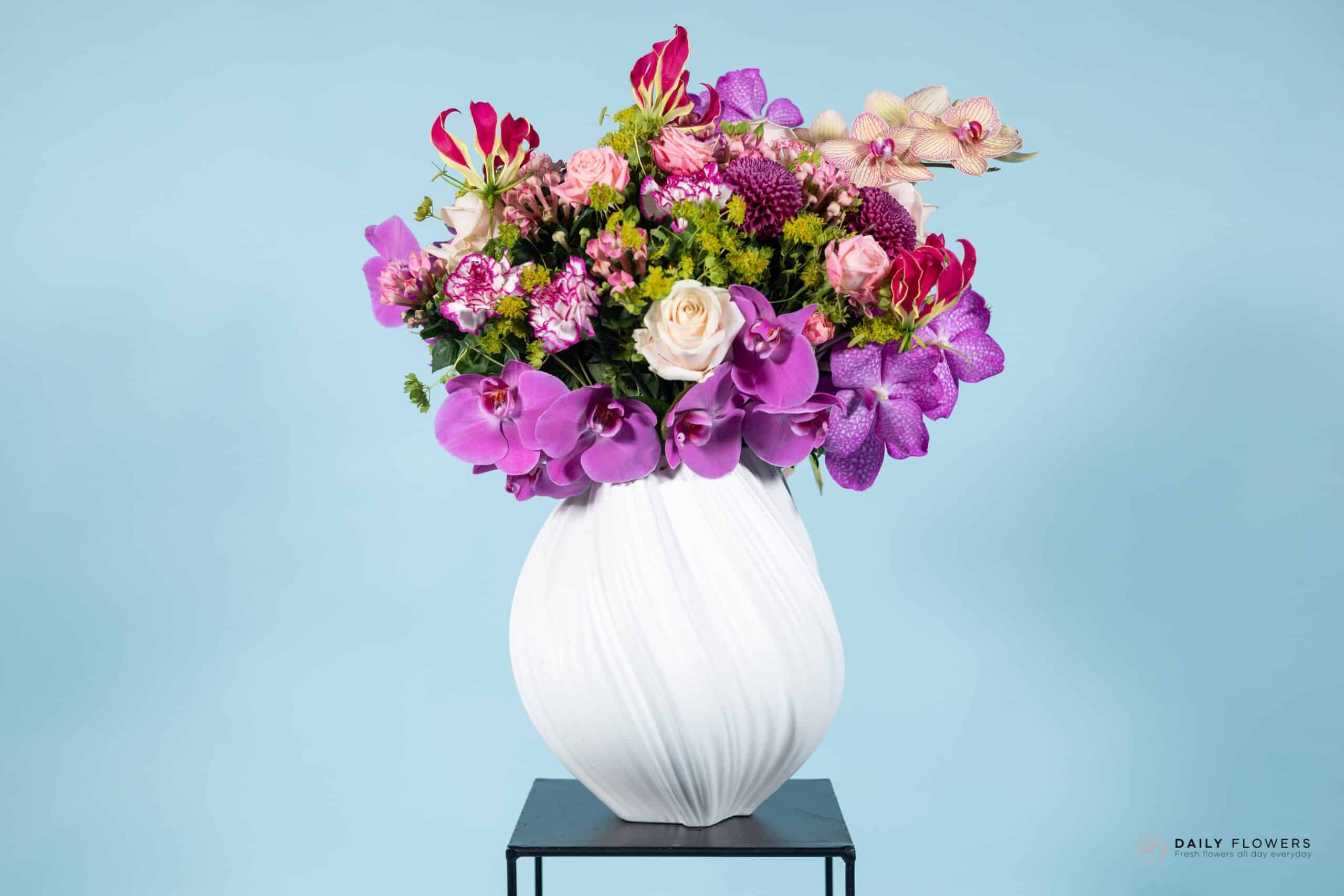 Absolutely Amazing Bouquet: Flowers in vase with soft pink, lavender and white blooms including roses, delphiniums and lisianthus.