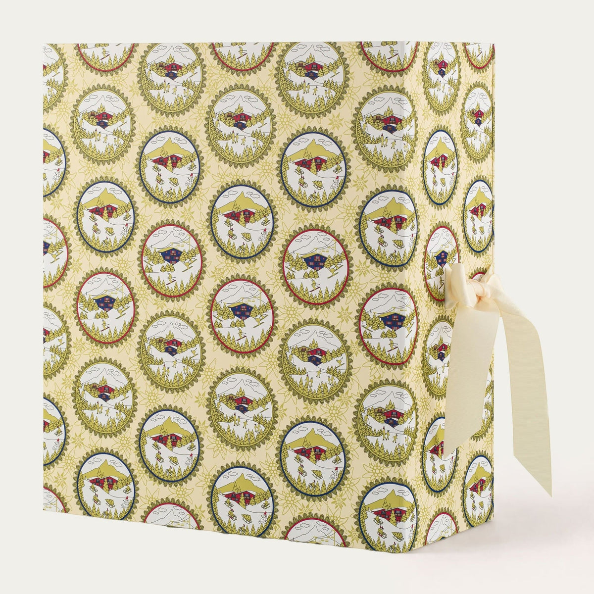 Baobab Advent Calendar Voyage Extraordinaire: closed gold book-shaped calendar with winter sports décor