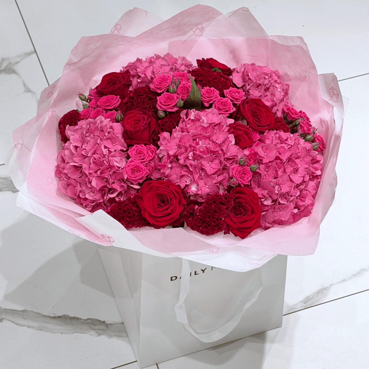 Chic Cherry Queen bouquet with roses and hydrangea by Daily Flowers