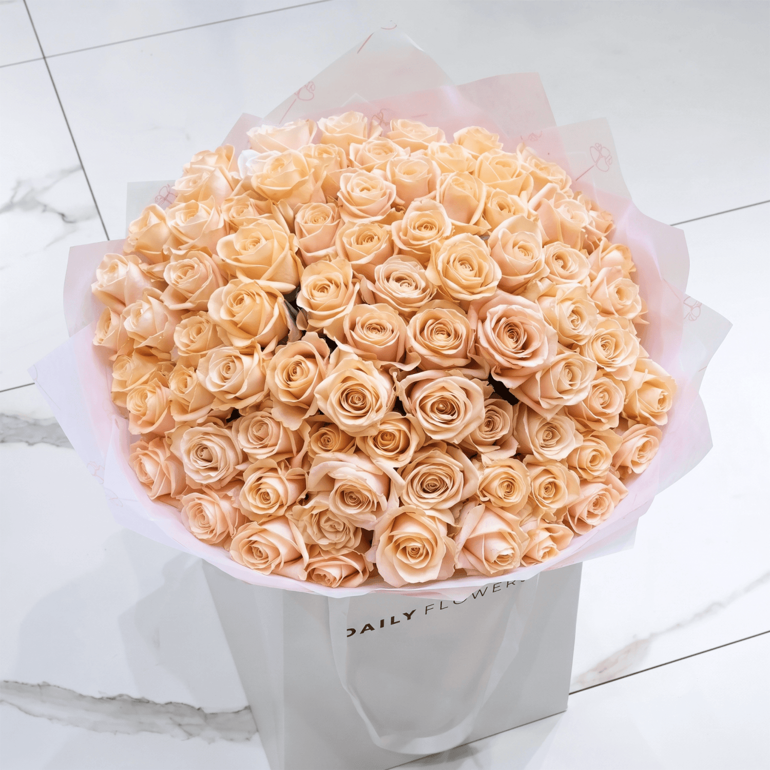 Peach Avalanche Roses boeket van Daily Flowers