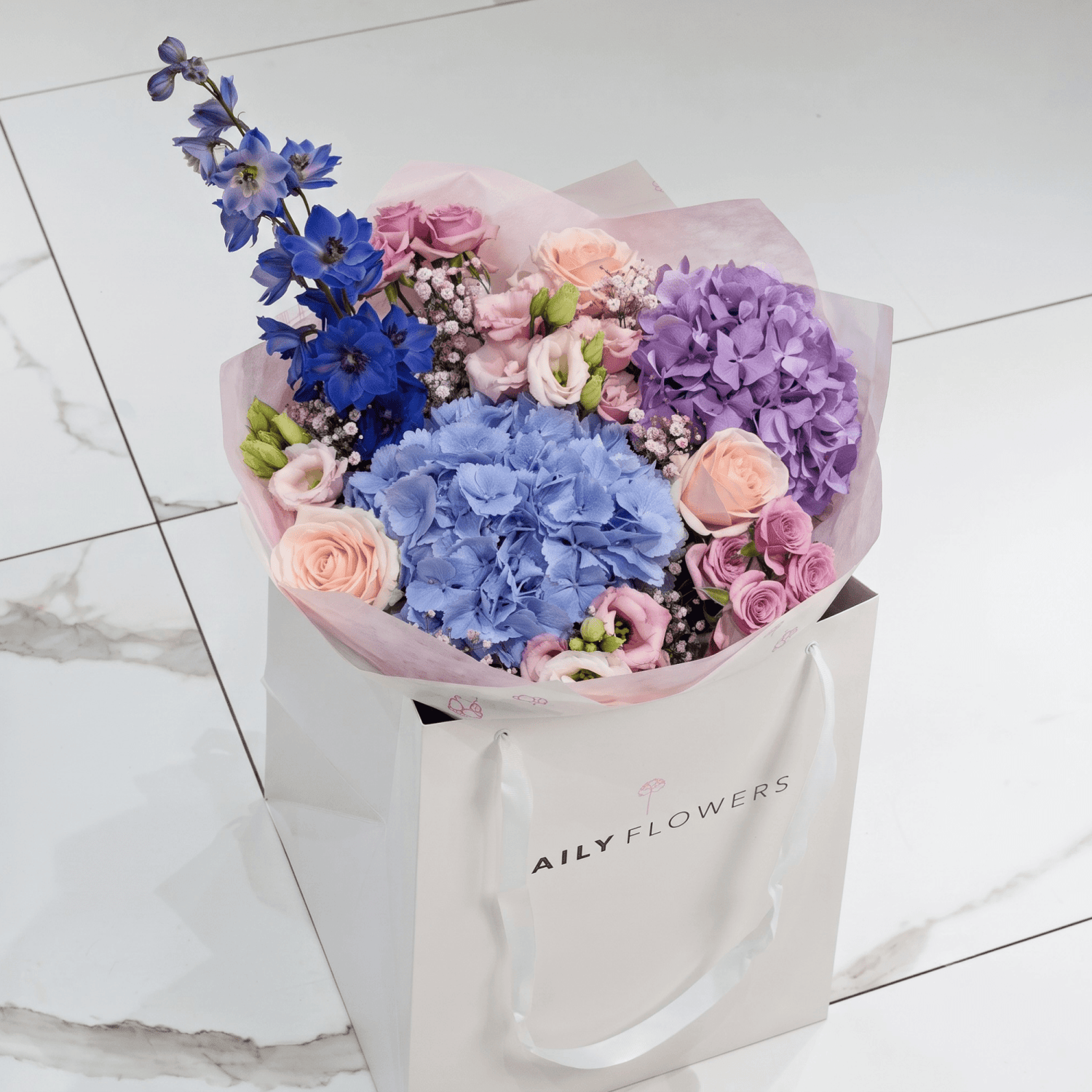 Violet Fairytale Dream bouquet with roses, hydrangea and gypsophila by Daily Flowers
