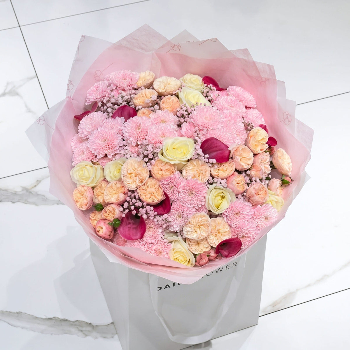 White Blush Romance bouquet, size Large: lush bouquet of peach garden roses, white roses, dark pink callas, pink chrysanthemums and pink gypsophila, by Daily Flowers