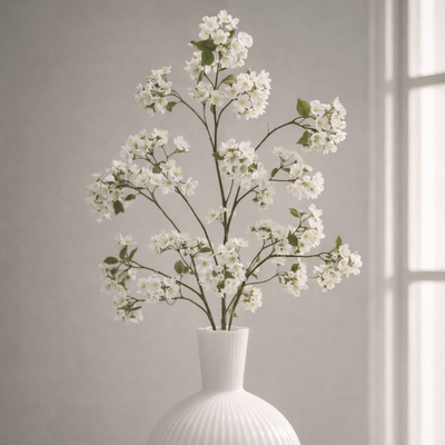 Ivory artificial apple tree branch close-up