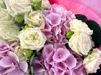 Pink hydrangea and spray roses