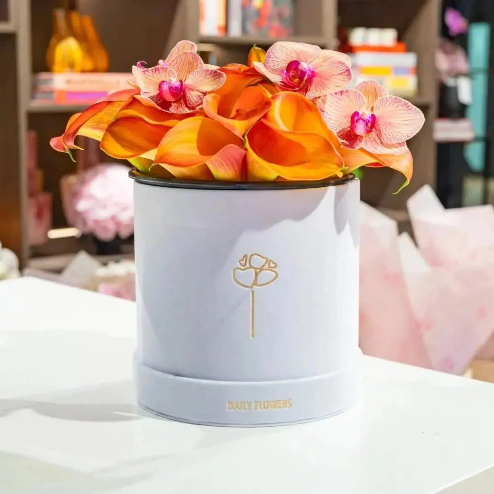 Autumn calla flowers in hat box Daily Flowers