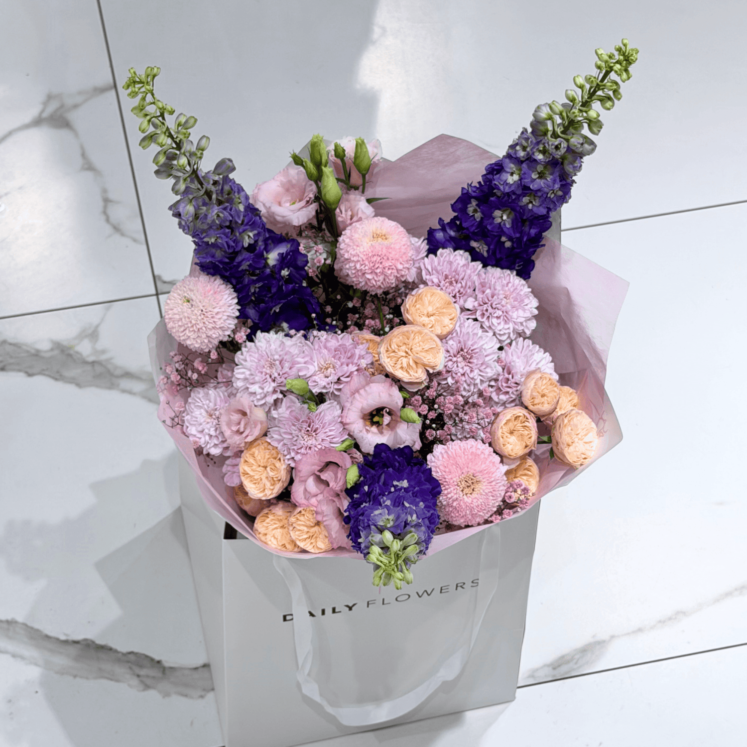 Blushing fairytale bouquet with roses, gypsophila and lisianthus by Daily Flowers