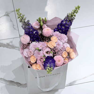 Blushing fairytale bouquet with roses, gypsophila and lisianthus by Daily Flowers