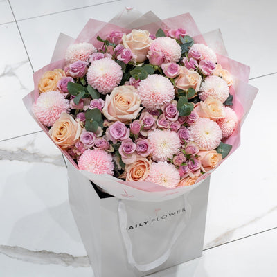 Blushing Love bouquet with roses and eucalyptus by Daily Flowers