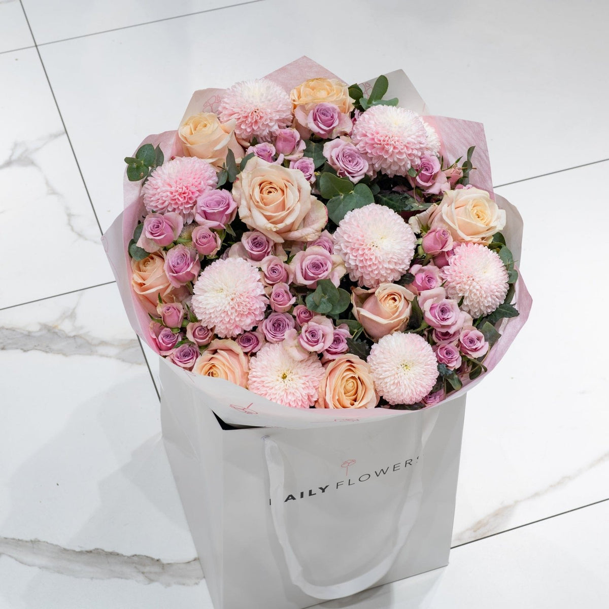 Blushing Love bouquet with roses and eucalyptus by Daily Flowers