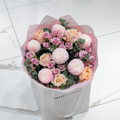Blushing Love bouquet with roses and eucalyptus by Daily Flowers