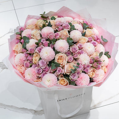 Blushing Love bouquet with roses and eucalyptus by Daily Flowers