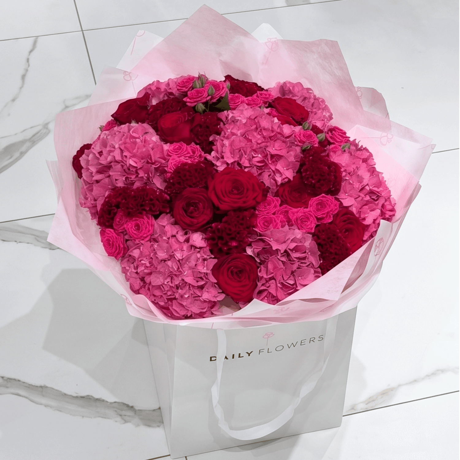 Chic Cherry Queen bouquet with roses and hydrangea by Daily Flowers
