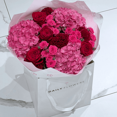 Chic Cherry Queen bouquet with roses and hydrangea by Daily Flowers