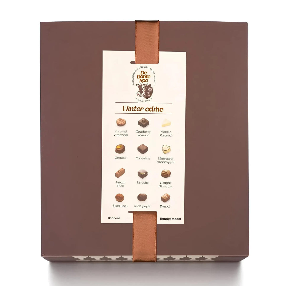 De Bonte Koe Letterbox Bonbons Winter Edition: brown gift box with copper ribbon and card showing the 12 winter flavours