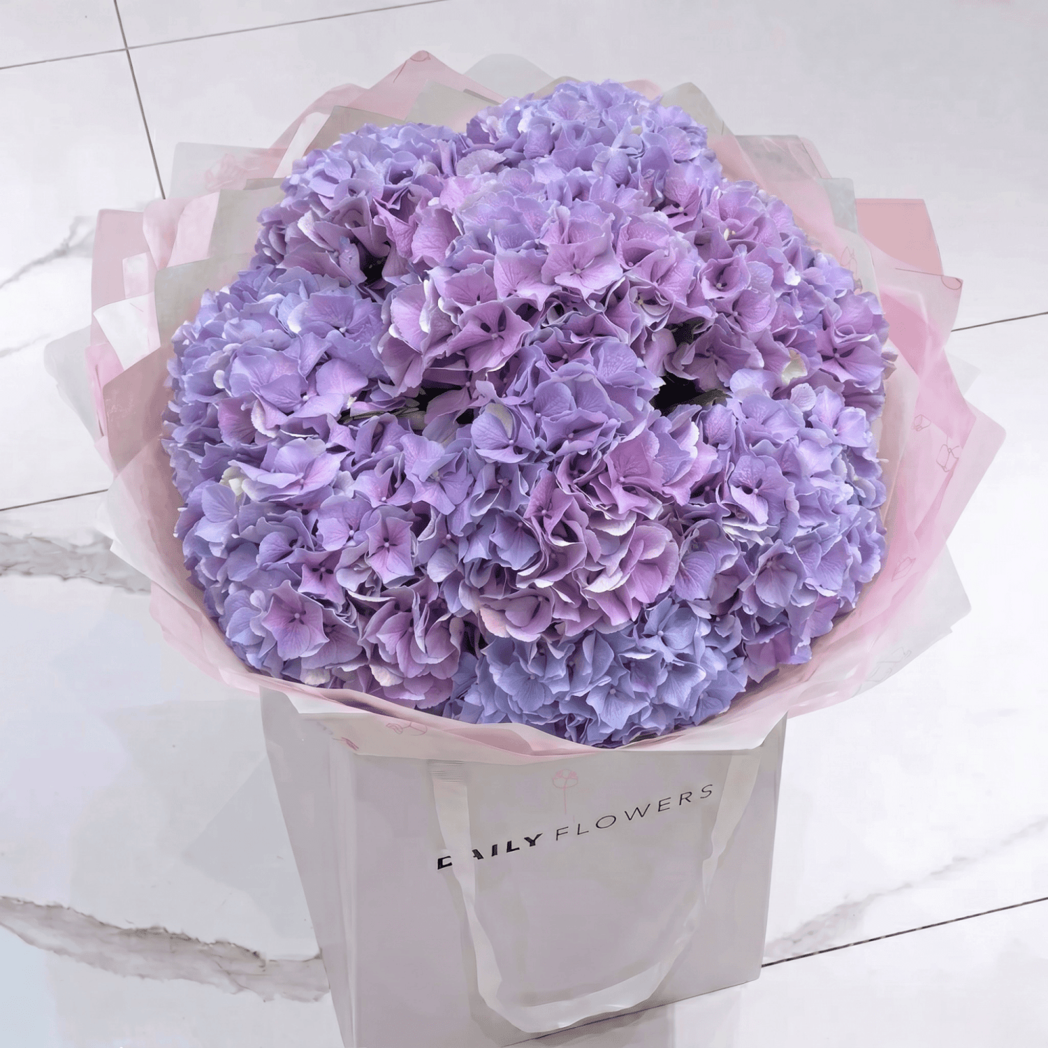 Purple Hydrangea bouquet by Daily Flowers