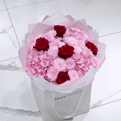 Red Romance Dream bouquet with roses, hydrangea and chrysanthemums by Daily Flowers