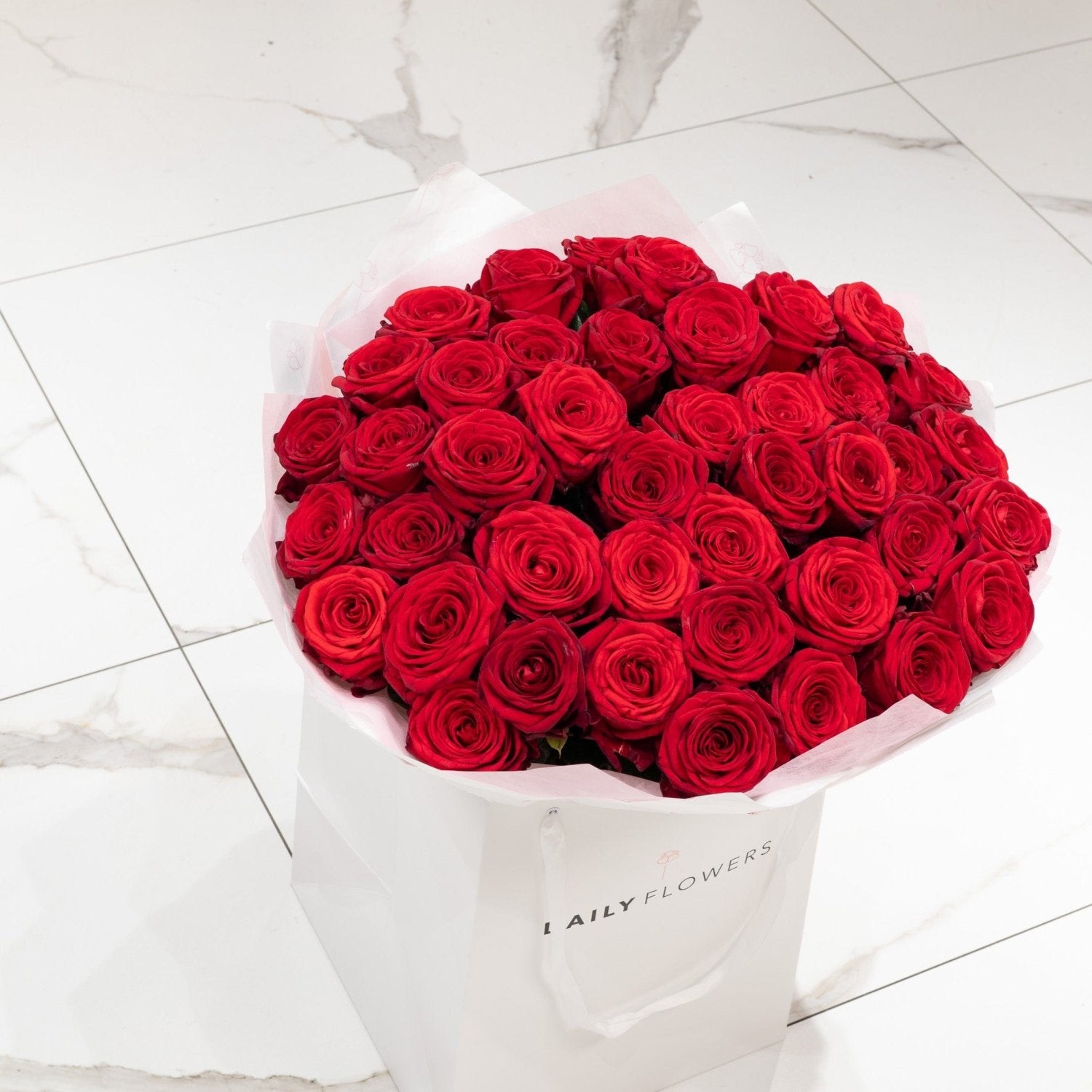Red Roses bouquet by Daily Flowers