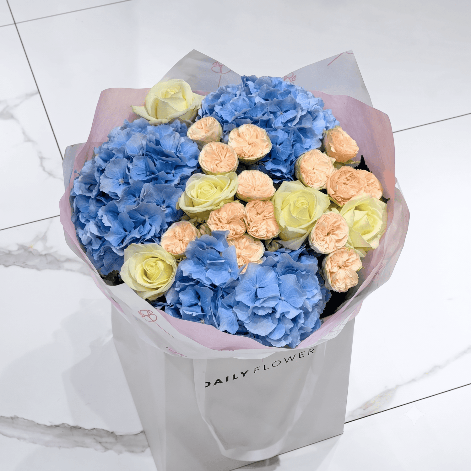 Royal Blue Blush bouquet with roses and hydrangea by Daily Flowers