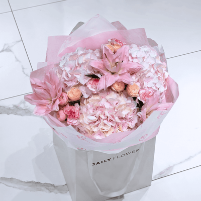 Royal Lily Dream bouquet with roses, hydrangea and lilies by Daily Flowers