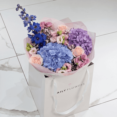 Violet Fairytale Dream bouquet with roses, hydrangea and gypsophila by Daily Flowers